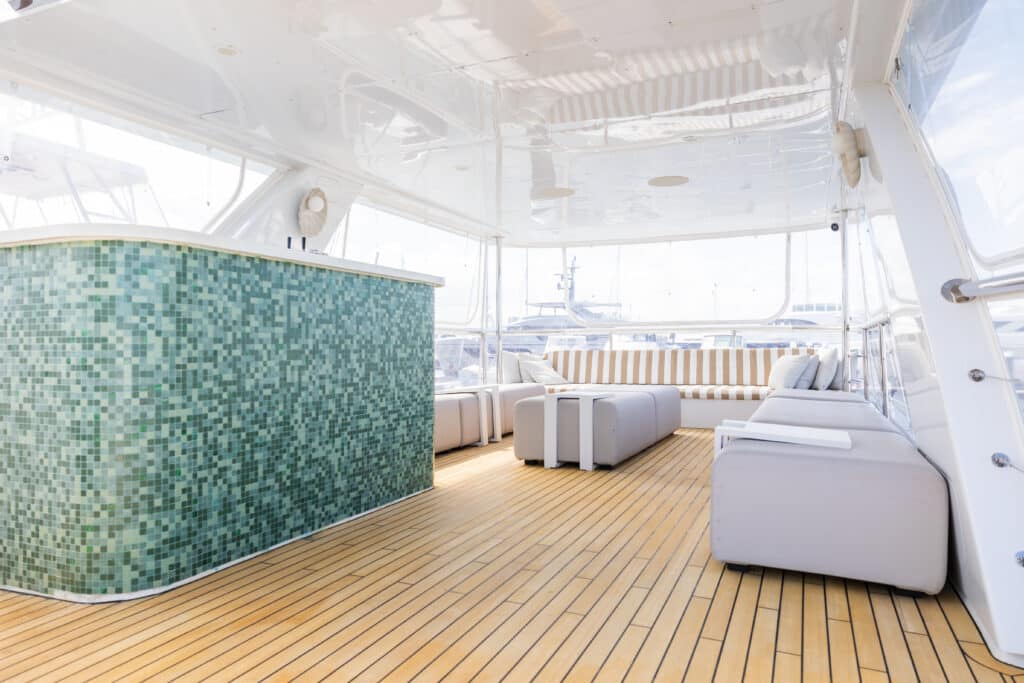 YOT 75 upstairs bar svg+xml;charset=utf - YOT 75 Private Charter